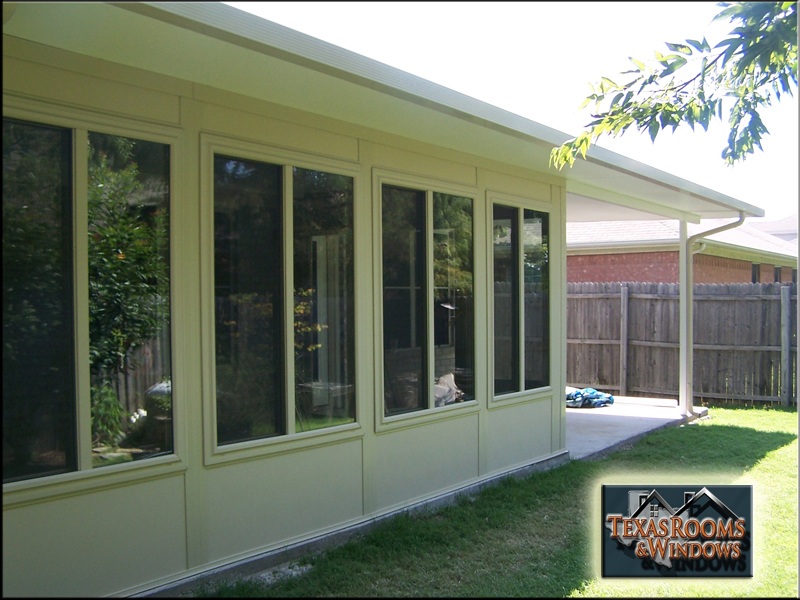 Sudio sunroom after picture w/ all glass walls